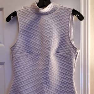 Quilted sleeveless turtleneck top